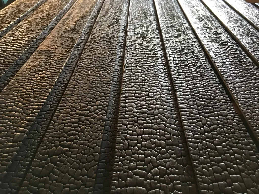 Charred timber cladding boards by Leforest
